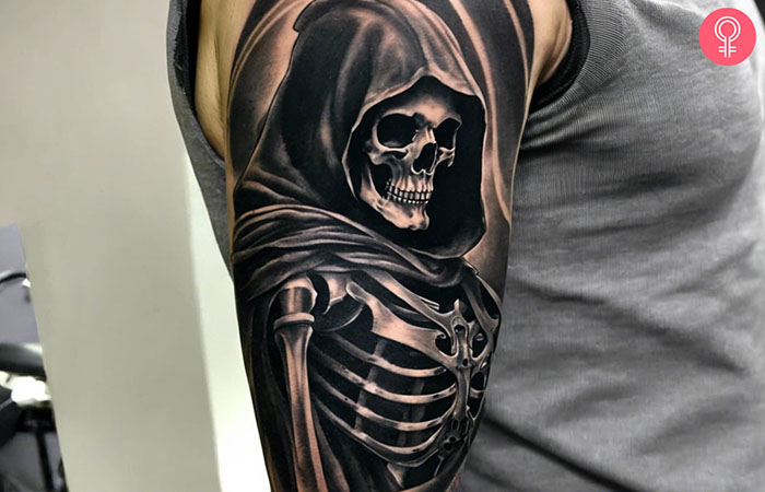 A skeleton tattoo on the arm of a man