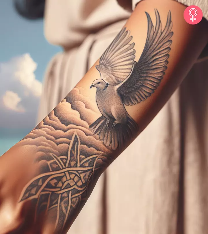 A woman sporting a dove tattoo on her forearm