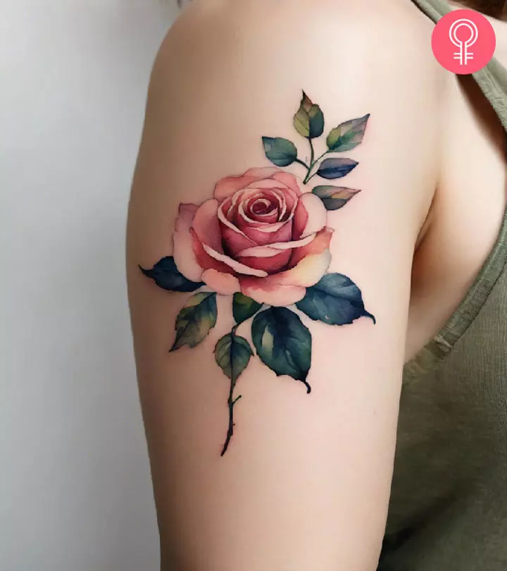 A woman sporting an aesthetic rose tattoo