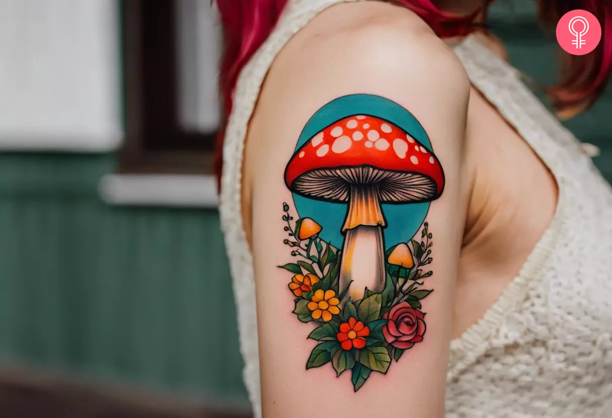 A woman with a traditional mushroom tattoo on her upper arm