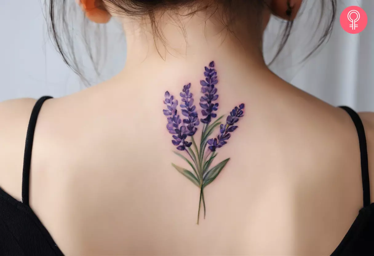 Abstract lavender tattoo on the nape of the neck