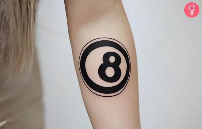 An 8 ball outline tattoo