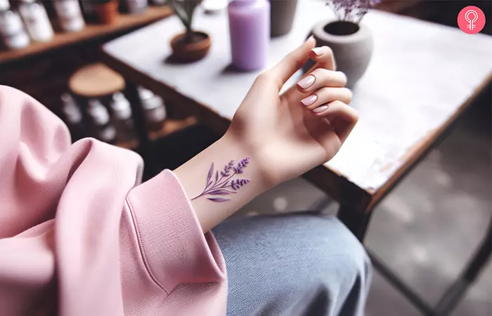 An anxiety survivor mental health tattoo on the wrist of a woman