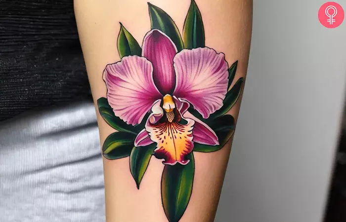 An orchid flower tattoo on the forearm