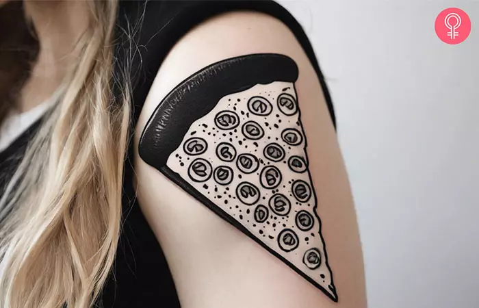 A black-and-white pizza tattoo