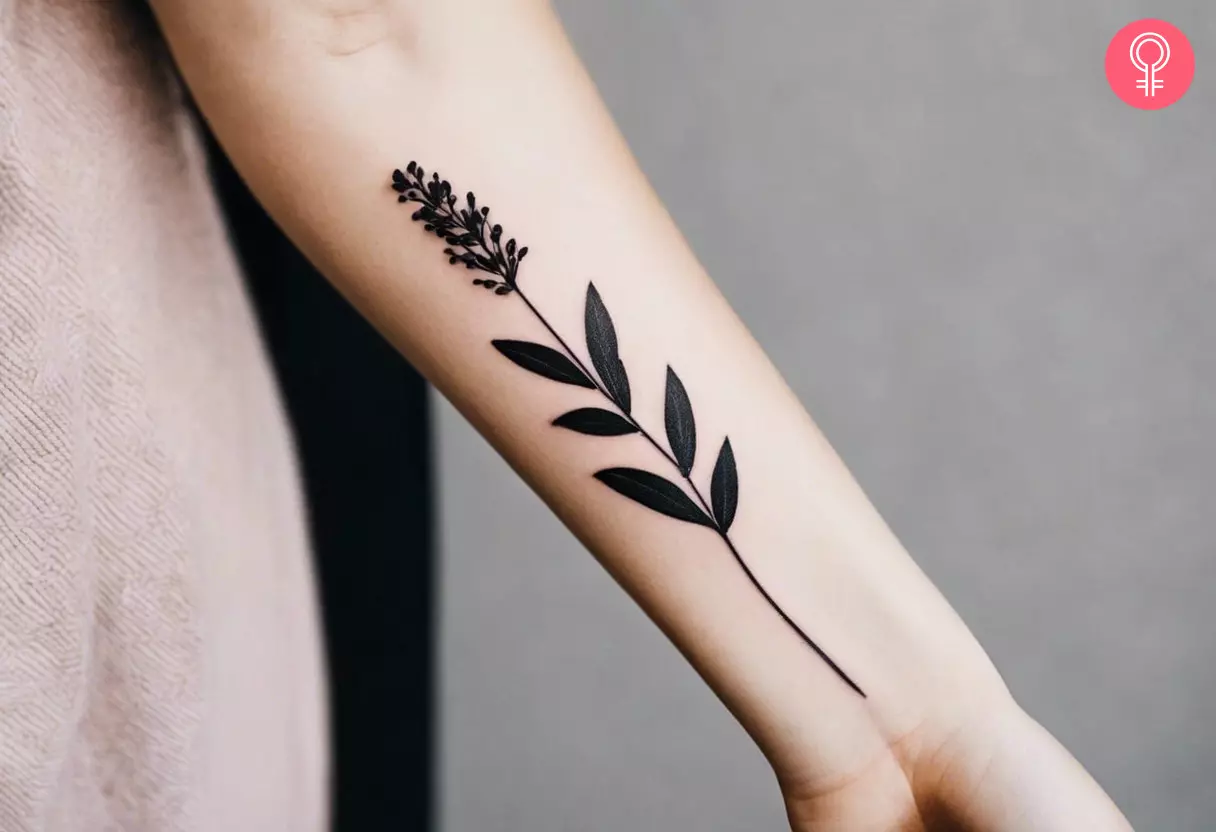 Black lavender tattoo on the arm