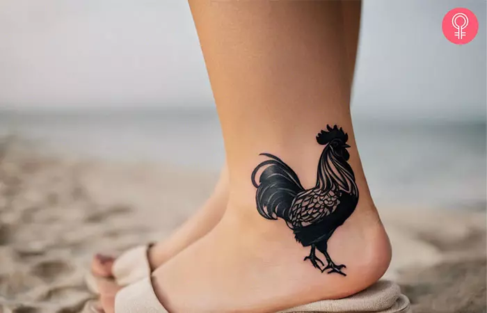 Black rooster tattoo on the ankle