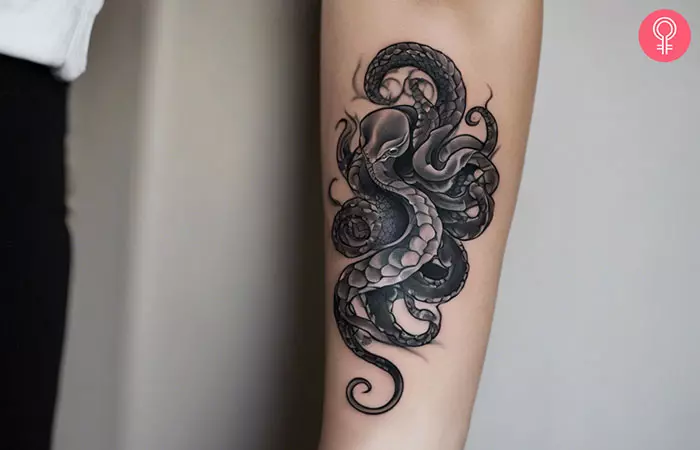 Black and grey Kraken tattoo on the arm