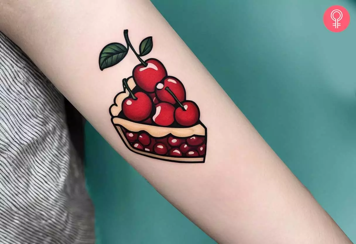 A cherry pie tattoo on the forearm