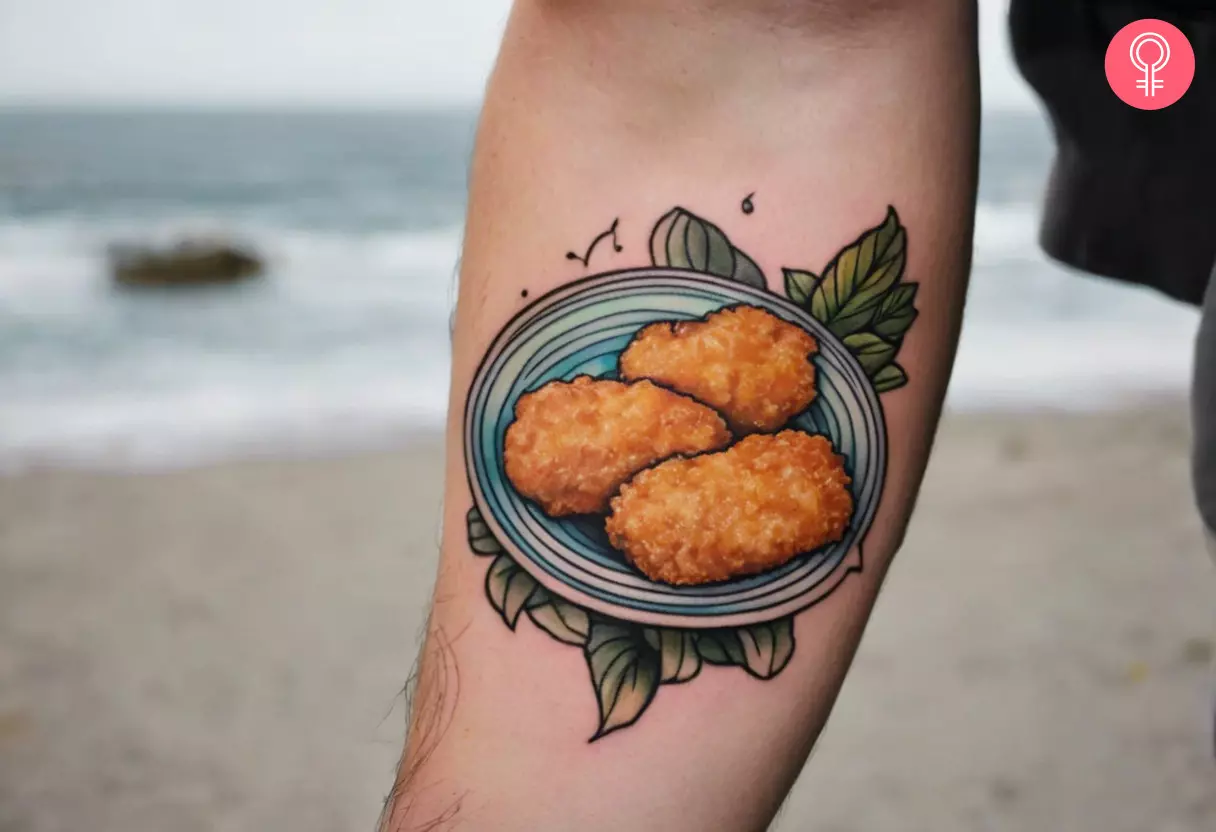 Chicken nugget tattoo on the forearm