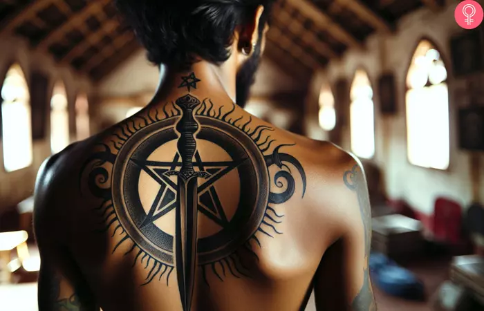 Dagger with the pentagram tattoo on the back of a man