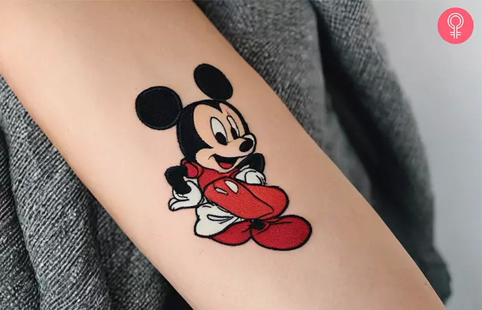 Disney mickey mouse embroidery tattoo on the the arm