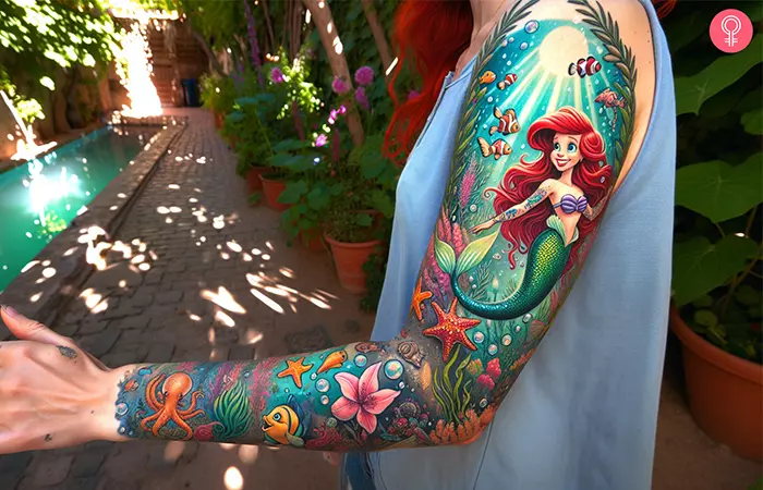 A Disney sleeve tattoo on a woman’s arm