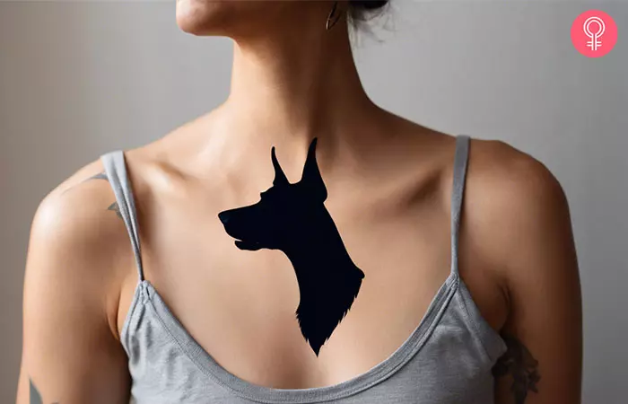 A tattoo of A Doberman’s silhouette