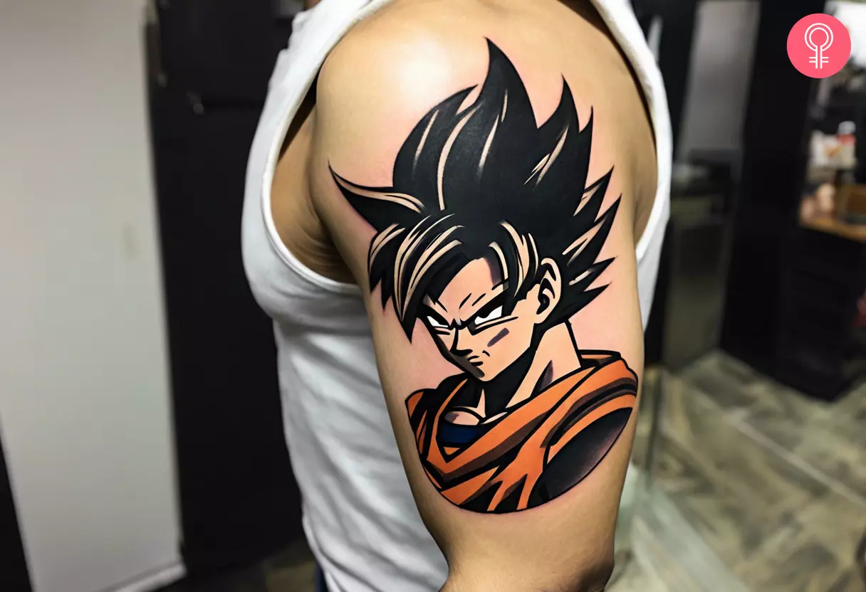 A fierce portrait of Goku on the upper arm