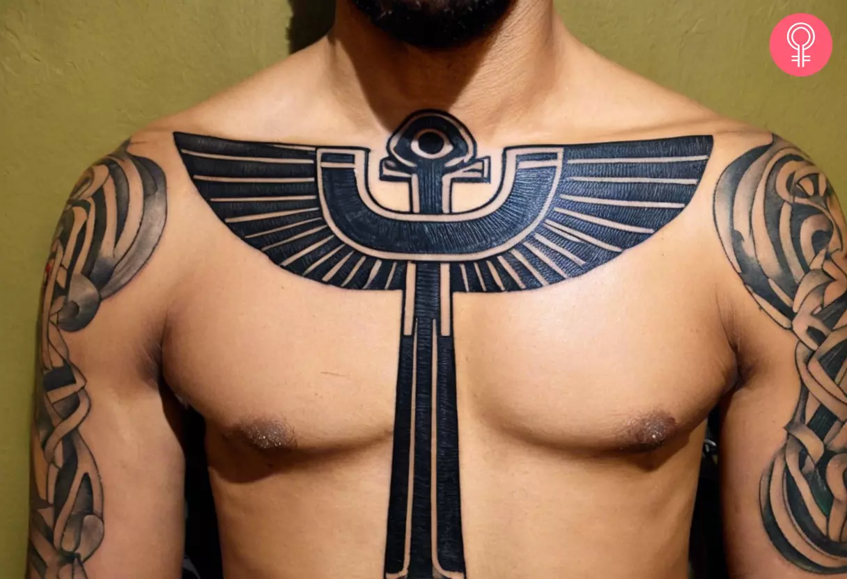 Egyptian ankh tattoo on a man’s chest