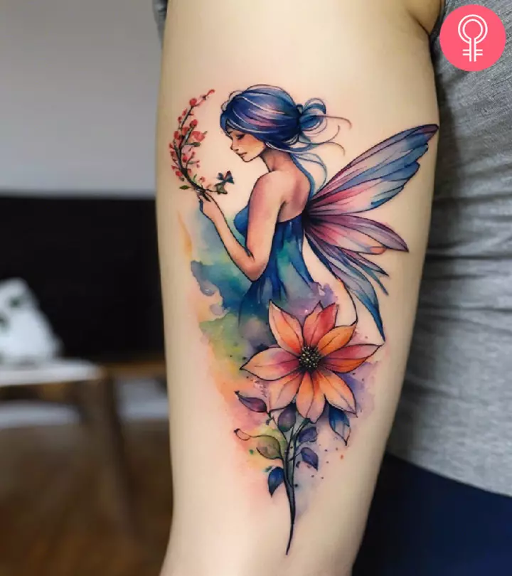 Fairy tattoo on the arm