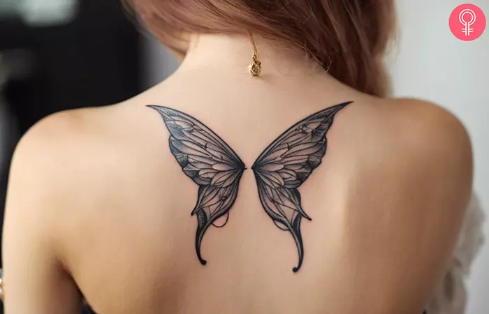 Fairy wings tattoo on the back