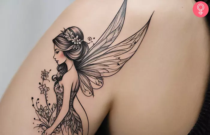 Fine line fairy tattoo on the arm