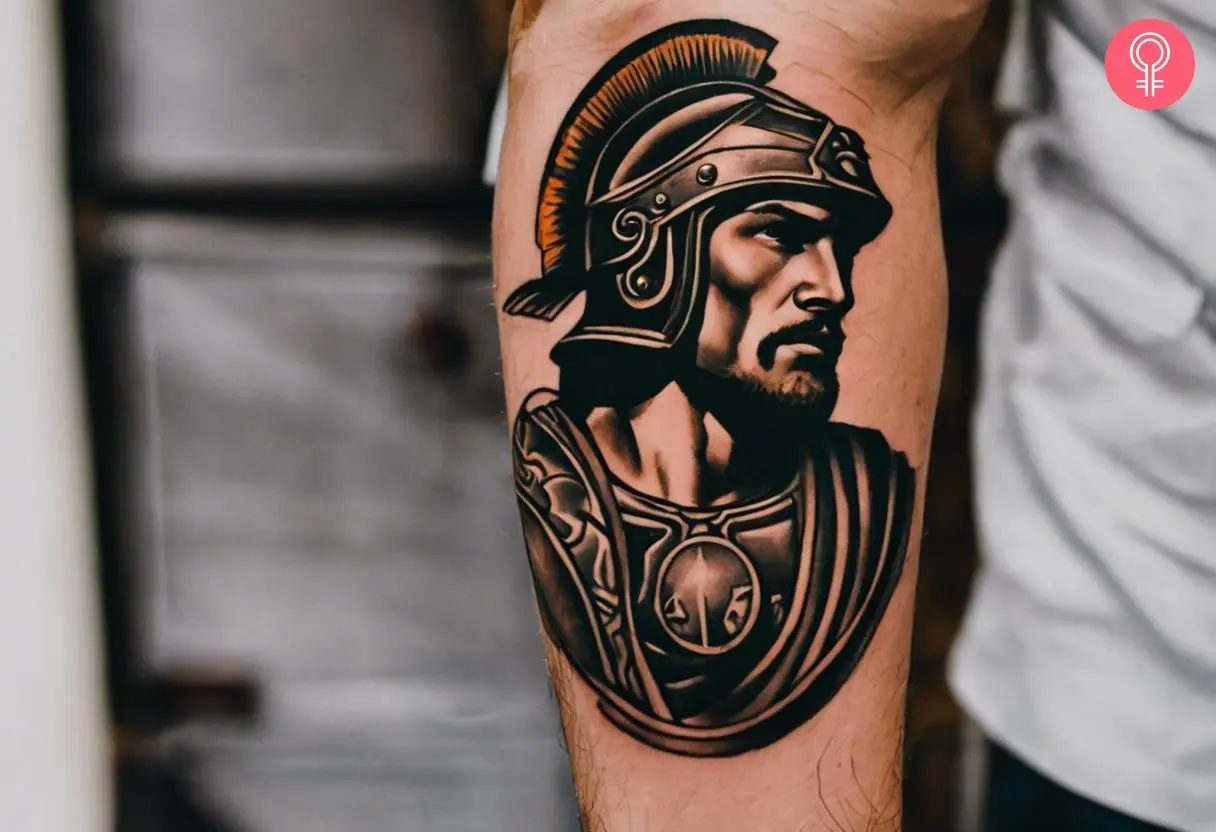 A man with gladiator forearm tattoo