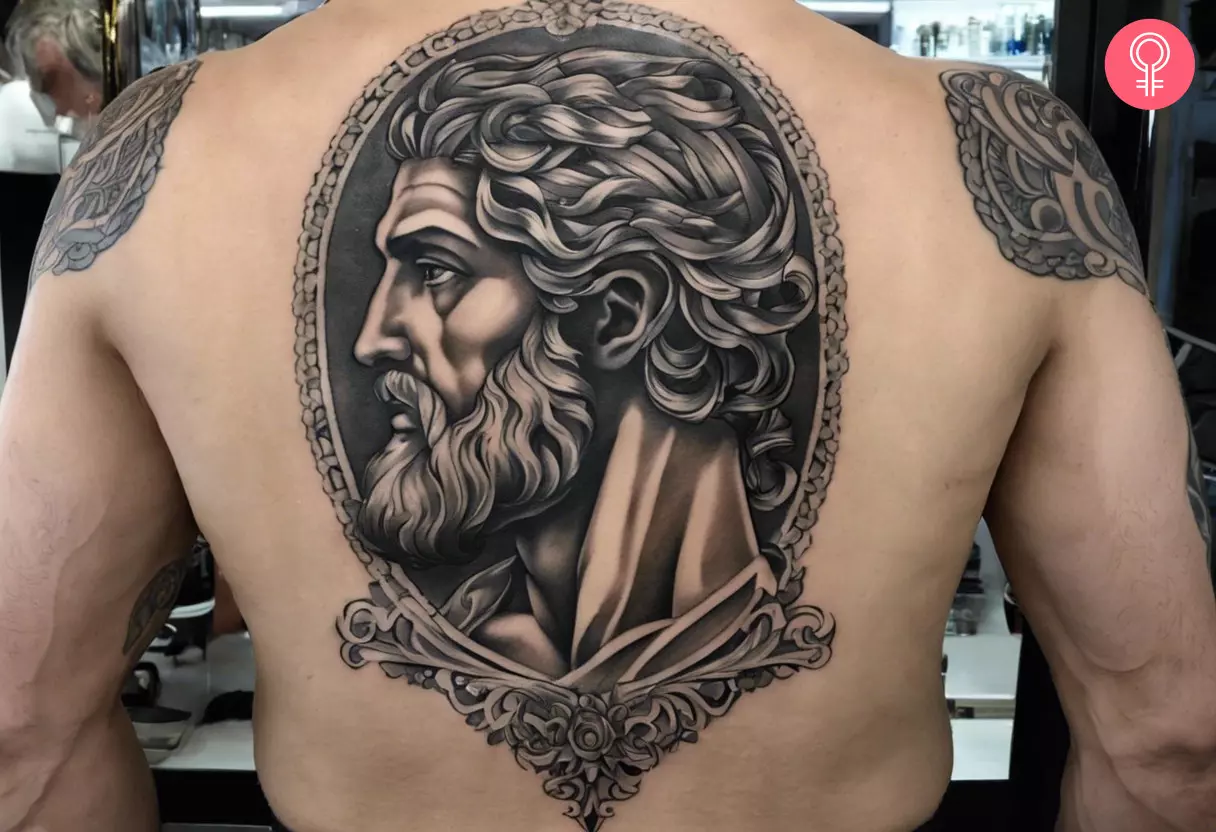 A man with a Greek filigree tattoo on the back