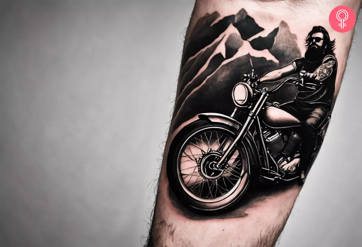 A guru/rockstar biker tattoo on the forearm