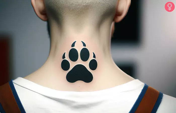 Husky paw print tattoo on the back of the neck