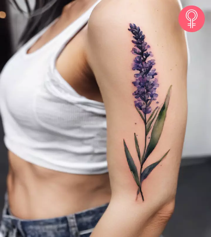 A lavender flower tattoo on the arm