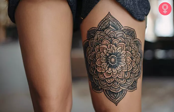 A mandala above knee tattoo