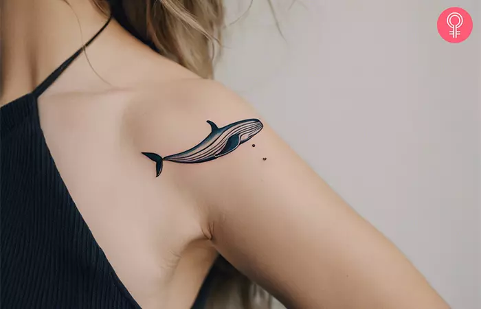 Minimalist whale tattoo