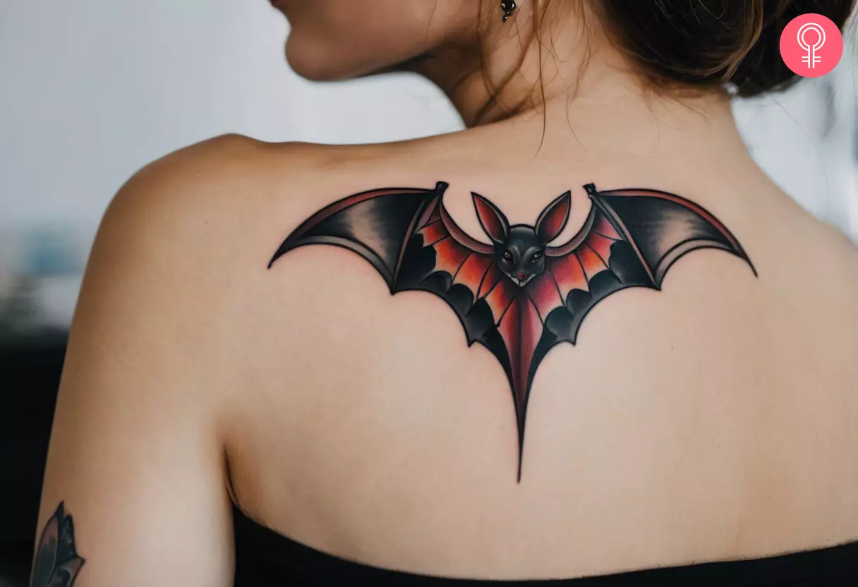 A bat tattoo on a woman’s back 