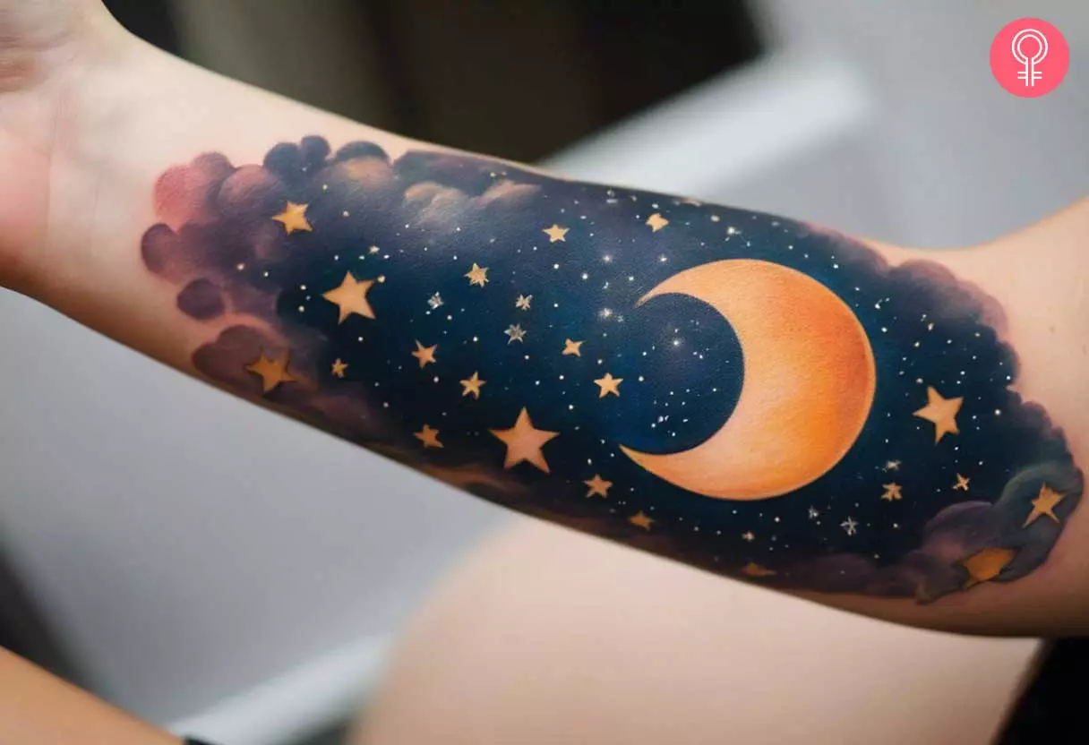 A tattoo of the night sky showing the moon and stars