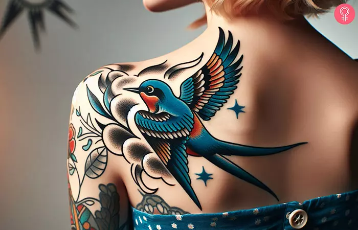 An old-school bluebird tattoo on the shoulder of a woman