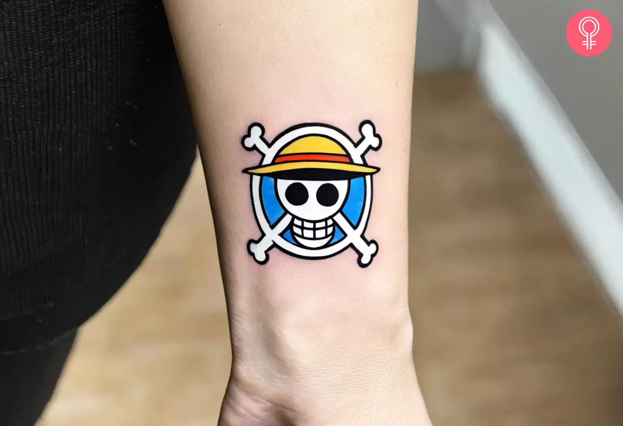 One Piece anime tattoo on a woman’s forearm