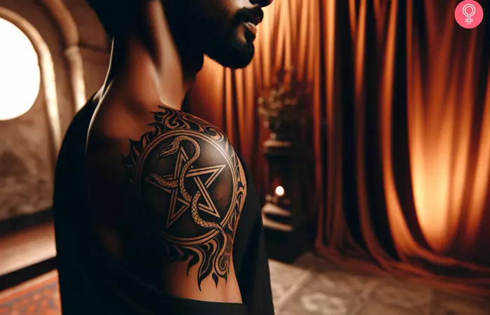 A pentagram with a snake tattoo on the shoulder