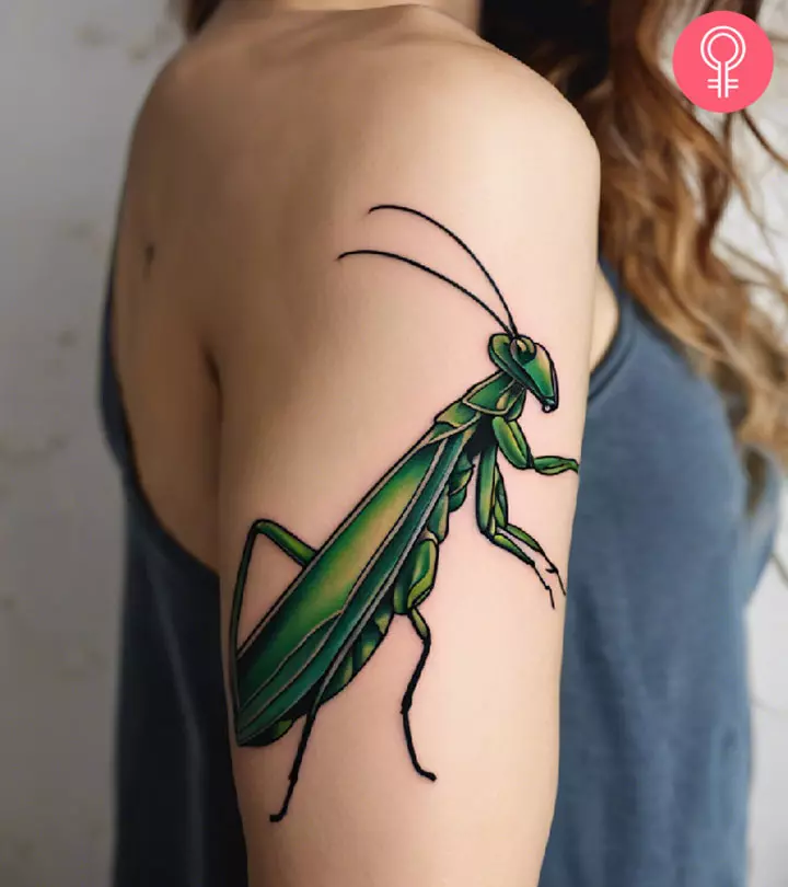Praying mantis tattoo on the upper arm
