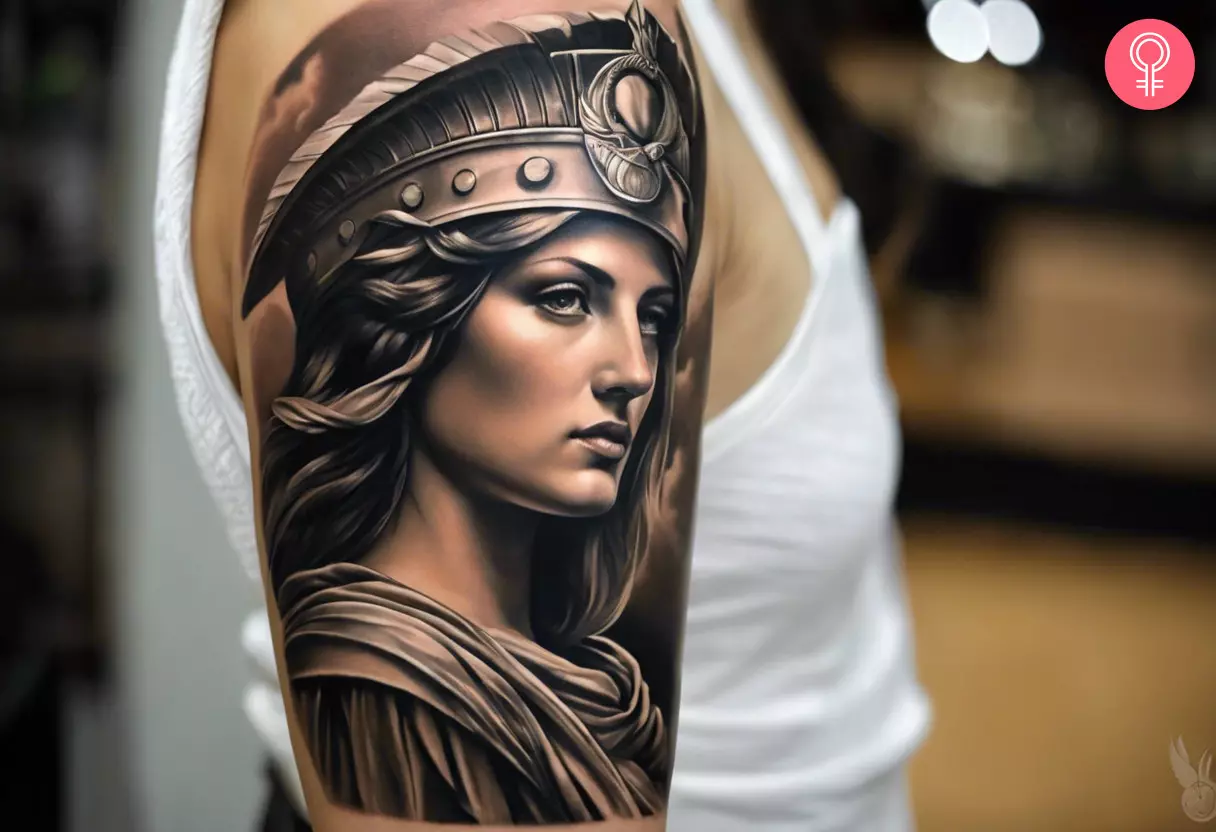 A realistic Athena tattoo design on the upper arm