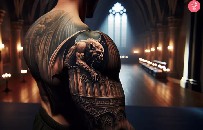 A realistic gargoyle tattoo on the shoulder of a man