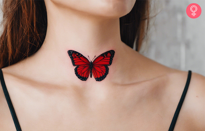 A woman with a red butterfly tattoo on her neck