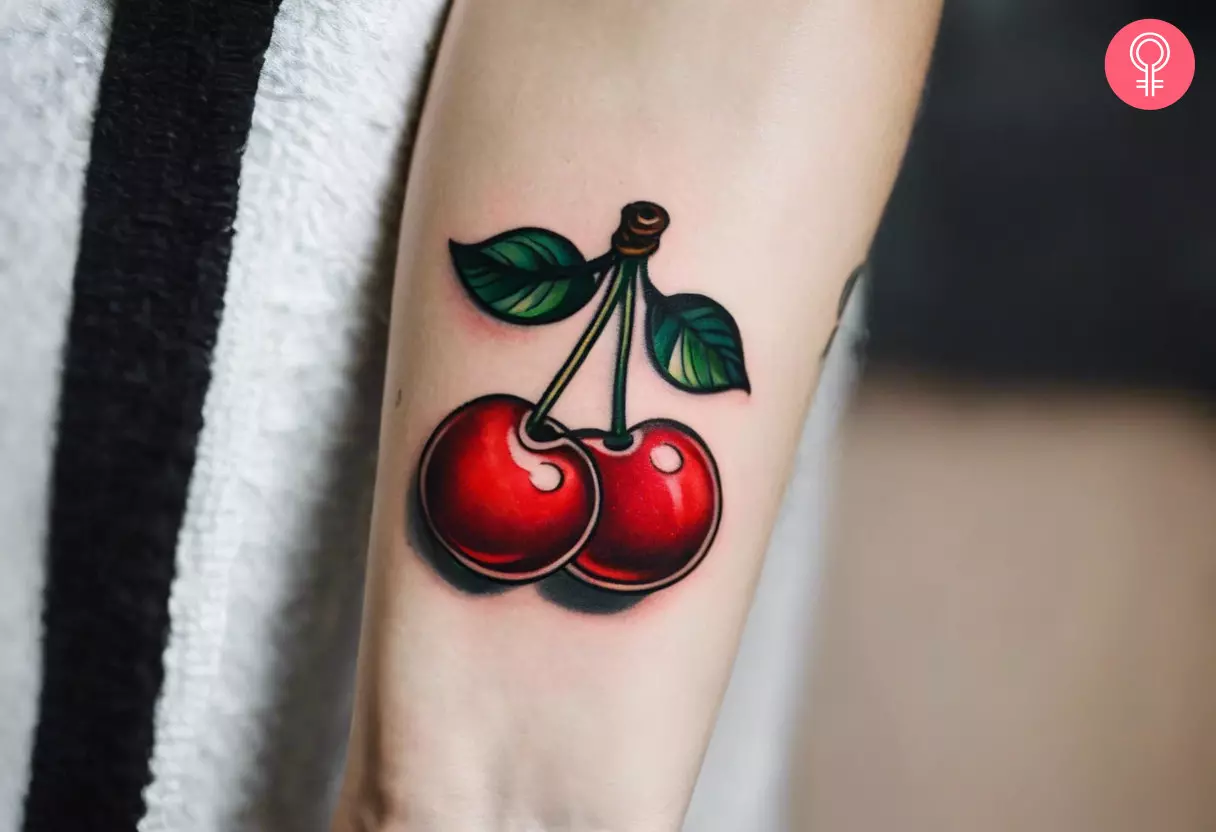 A cherry pie tattoo on the forearm