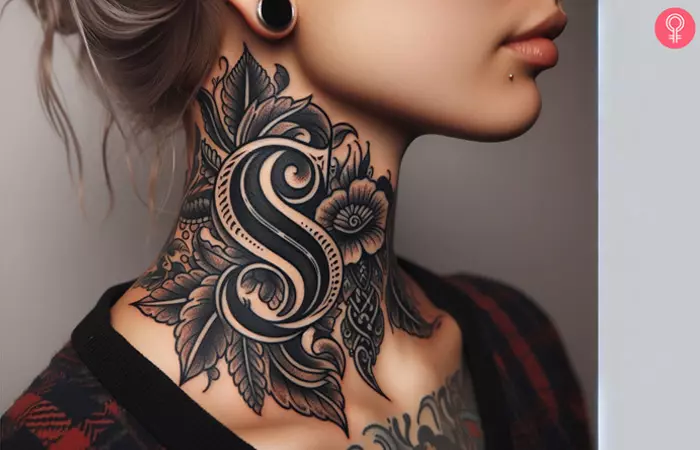 Woman with S letter tattoo on the neck