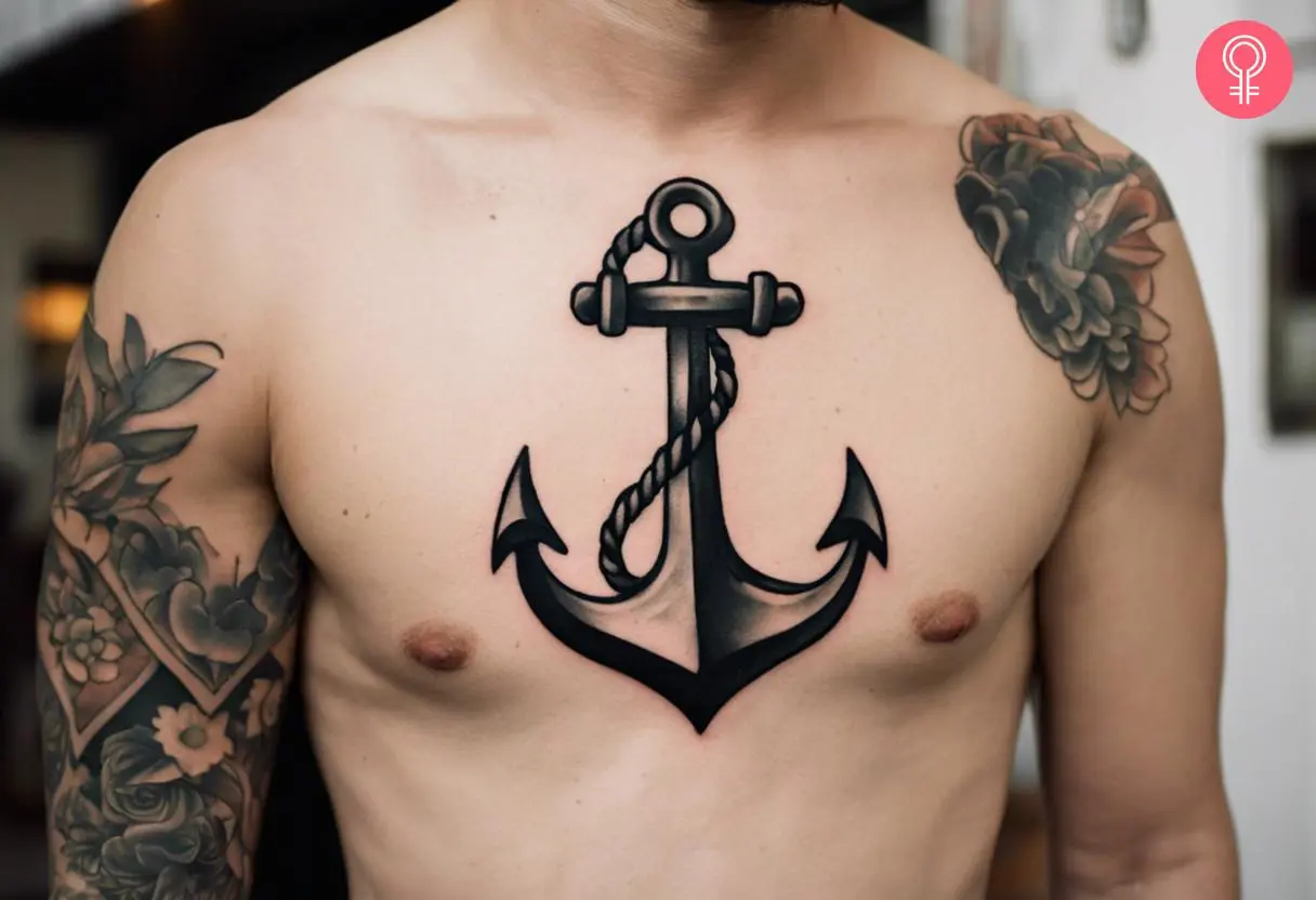 Ship anchor tattoo on the chest of a man