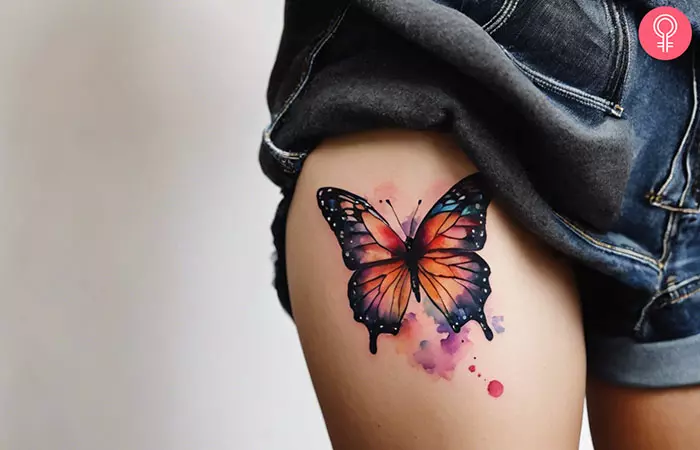 butterfly side thigh tattoo