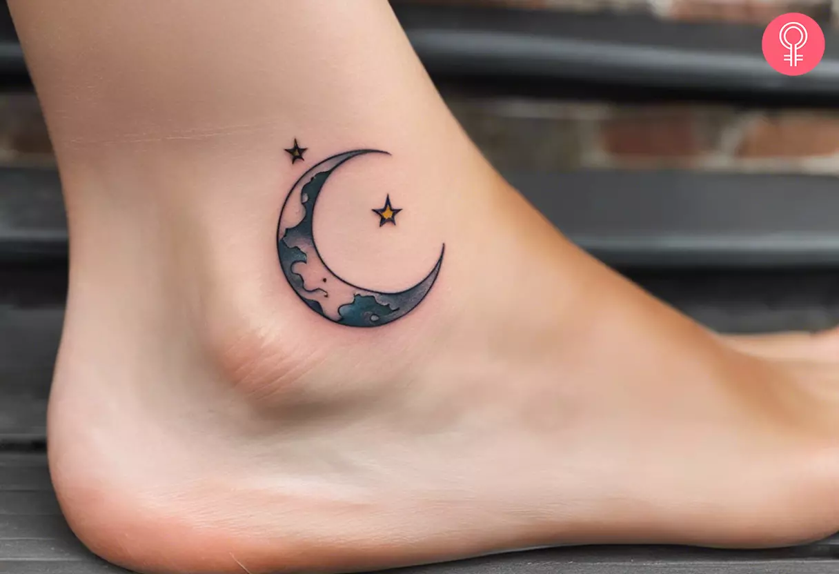 A tattoo of the moon and stars tattoo on the ankle