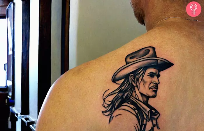 Simple cowboy tattoo on the back shoulder