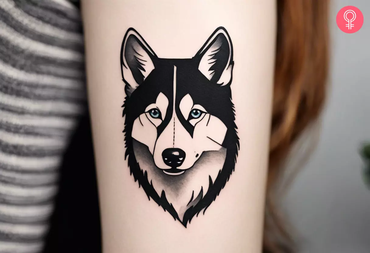 Small husky tattoo on the arm