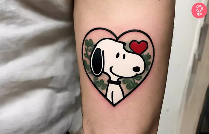 Snoopy flash tattoo on the upper arm