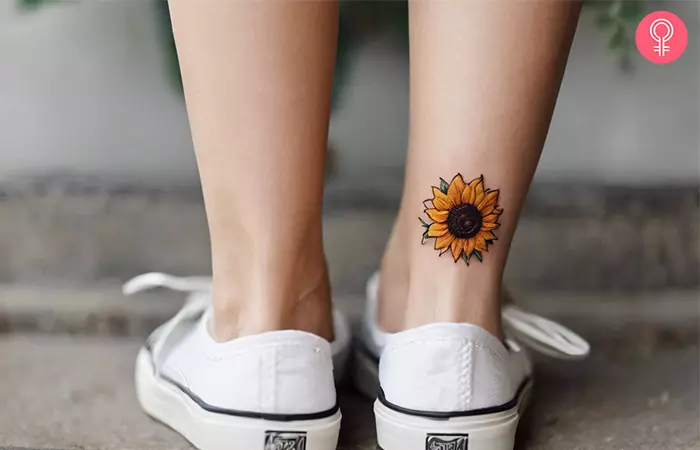 Sunflower embroidery tattoo on the the calf