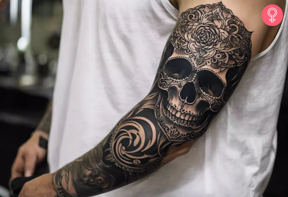 A man with a Victorian filigree tattoo filler on his arm