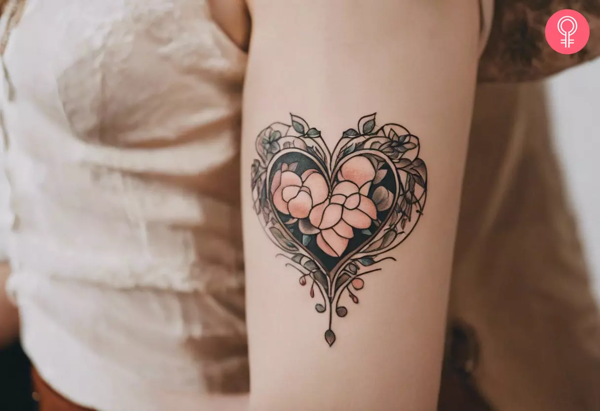 Vintage aesthetic tattoo on the upper arm